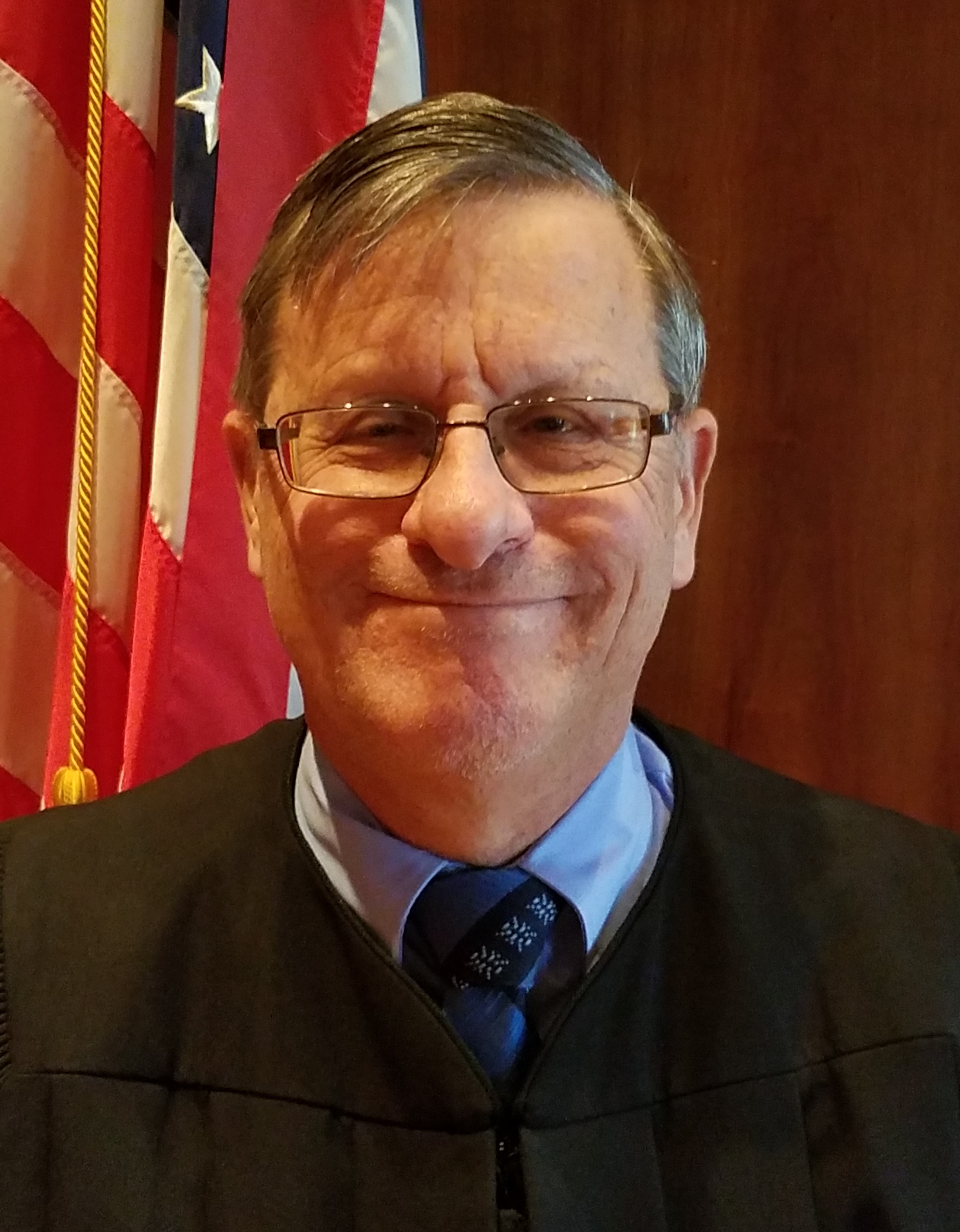 Photo of Justice Thomas J. Baker