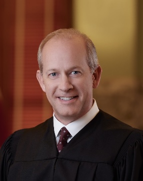 Photo of Justice Kevin Jewell