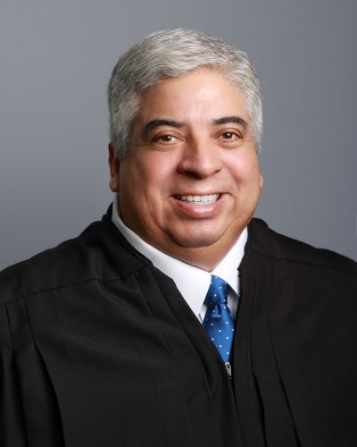 Photo of Justice Lionel Aron Peña Jr.